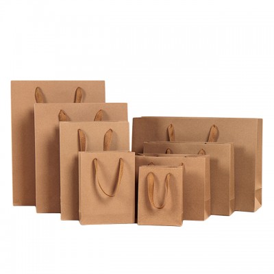 China manufacturer custom kraft shopping gift paper bags with your own logo